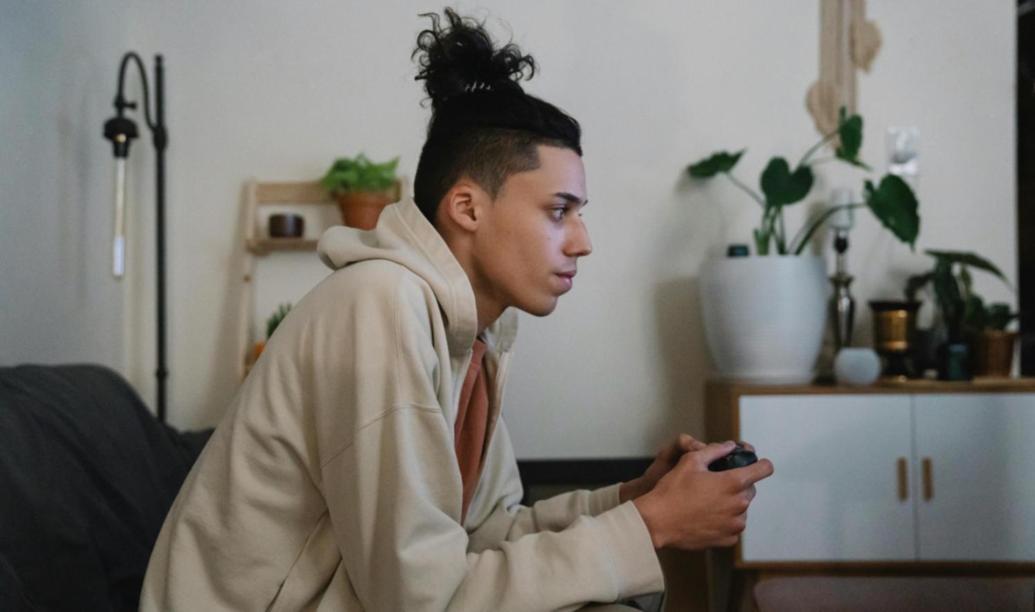 Students engaged in collaborative gaming strategy session